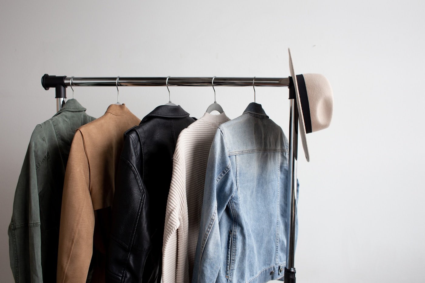 Menswear hanging on a studio rail